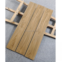 Carreaux de sol en céramique de style bois massif 200x1000mm, disponibles pour revêtements de sol et murs, idéaux pour les intérieurs de villas et les murs en briques.