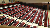 Tribunes de basketball escamotables automatiques pour intérieur, sièges mobiles durables avec garantie de 5 ans pour gymnases, arènes et événements sportifs