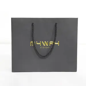Kustom cetak Logo Foil emas cetak kertas kardus tas hitam kemasan belanja garmen tas hadiah