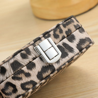 Boîte à bijoux rectangulaire portable créative à imprimé léopard haut de gamme pour bagues et colliers