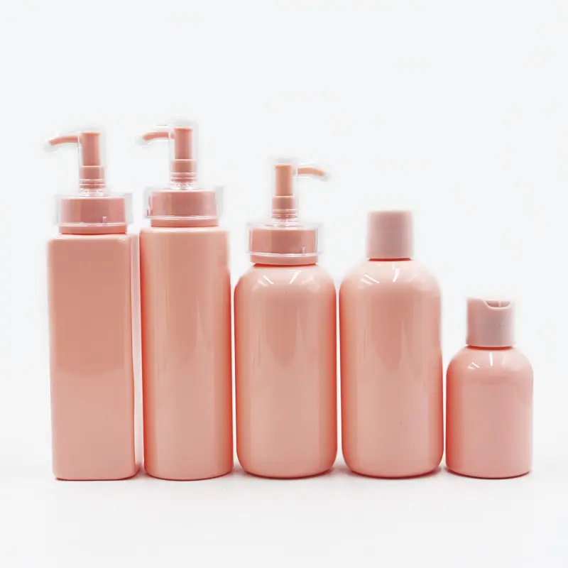 Venta caliente de fábrica botella cosmética de color rosa para el cuidado de la piel 100mL 200ml 250ml loción champú envase cosmético con bomba rosa