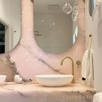 Comptoirs de cuisine, murs de salle de bain, escaliers extérieurs, chambre à coucher, hall, salon en marbre onyx rose naturel luxueux Cammy Stone