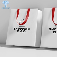 Chinesische Hersteller Günstige Handtasche Schwarz-Weiße Papiertüte mit Logodruck