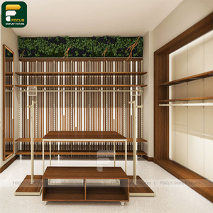 Présentoir contemporain pour magasin de vêtements avec panneau arrière incurvé et armoire de suspension pour vêtements - Product Image 2