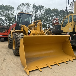 รถตักล้อยาง CAT 966L มือสอง เครื่องยนต์ Caterpillar รับน้ำหนักได้ 9 ตัน สีเหลือง อุปกรณ์ก่อสร้างสำหรับงานดิน - Product Image 3