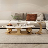 Table basse ovale en pierre légère de style italien, table d'appoint double boule de luxe léger et simple pour la maison, combinaison tendance