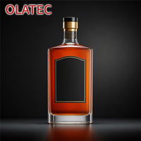 Collection de bouteilles en verre OLATEC Premium avec textures en relief, incrustations métalliques et boîtes personnalisées pour Cognac, Whisky et spiritueux de luxe