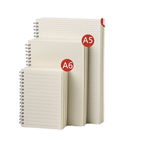 Cahiers simples à reliure spirale A4/A5/B5 avec logo de couverture PP transparent Papeterie en vrac bon marché personnalisable de fournisseur fiable