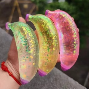 Jouets Squishy en forme de banane à paillettes, transparents, en gelée souple, anti-stress, nouveauté pour cadeaux, vente en gros - Product Image 2