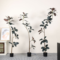 Élégant arbre artificiel en pot avec feuillage vert et base noire pour la décoration de table intérieure à la maison et au bureau