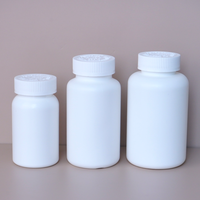 Flacon vide en plastique PET blanc avec bouchon à clapet argenté pour compléments alimentaires, vitamines, gélules et médicaments, avec tamis cylindrique