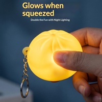 Porte-clés anti-stress en silicone coloré en forme de chignon lumineux, jouet multicolore de dessin animé pour étudiants et employés de bureau