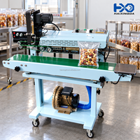 Machine de scellage continu à remplissage d'air Smart Choice, soudeuse thermique pour l'emballage de sachets de snacks (boucles d'oignon) en usine alimentaire