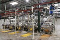 Autoclave rotative à haute uniformité avec système de pulvérisation d'eau pour le traitement du lait en bouteilles PP/verre