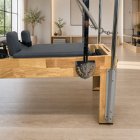 Cadillac Reformer Combo Pilates Gris Anthracite Durable avec Barre de Repose-Pieds Externe et Boîte de Rangement Intégrée pour Entraînement Corporel en Studio