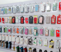 Présentoir mural pour téléphones portables, collations, chaussettes et boucles d'oreilles, avec crochets muraux à installation libre pour intérieur, étagère avec barre de suspension et crochets