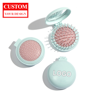 Nouveau style peigne à cheveux pliant peigne à coussin d'air portable pour l'extérieur avec logo personnalisé mignon mini peigne à cheveux avec miroir