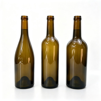 Bouteille de vin vide ronde en verre ambré vert foncé 750 ml, prix d'usine, vente chaude, bouteilles de vin en verre personnalisées pas chères avec bouchon couronne et couvercles