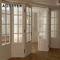 Puerta Plegable de Aluminio Estilo Francés Blanca AOSTTER con Vidrio Templado Transparente y Riel Empotrado para una Elegante Casa de Campo