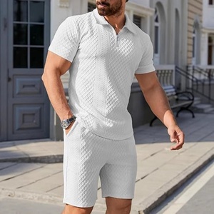 Conjunto de punto jacquard para hombre Europa América, conjunto de polo de punto informal con estampado y botonadura sencilla - Product Image 1
