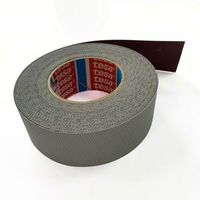 Ruban adhésif en tissu enduit de caoutchouc silicone gris tesa 4863 50 mm x 25 m avec des propriétés de adhérence exceptionnelles, applications d'enroulement de rouleaux