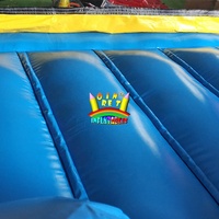 Aire de jeux gonflable compacte pour enfants, idéale pour les jardins résidentiels