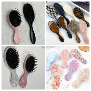 Mini cepillo de pelo redondo rosa para bebé con cerdas de nailon de jabalí de plástico de bolsillo de viaje con logotipo personalizado - Product Image 6