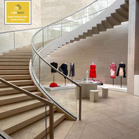 Escalier en métal moderne de luxe préfabriqué par CBMmart, design d'escalier en verre personnalisé, escalier courbé en bois