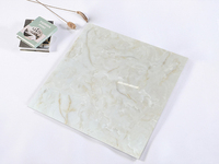 Vente flash Carreaux de sol effet marbre pleine masse 800mm Design moderne Jaune jade chaud Antidérapant Résistant à l'usure Éclairage pour salon