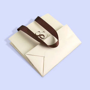 Sacs cadeaux en papier personnalisés écologiques avec poignée, emballage pour boutique de détail pour les petites entreprises - Product Image 4
