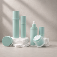 Ensemble d'emballages cosmétiques de haute qualité en plastique rose, vert et blanc à double couche, flacon de lotion, sérum et crème en plastique givré AS