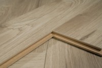 Revêtement de sol stratifié HDF MDF en chevrons, résistant aux taches, antidérapant, pour la décoration de la maison, salon