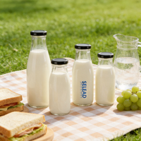Vente en gros de bouteilles en verre vides pour le lait, le jus, le café, le thé, les boissons énergisantes, les boissons gazeuses avec couvercles métalliques
