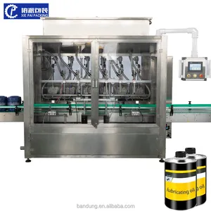 Línea de producción automática Máquina de llenado de líquido de aceite lubricante de agua de vidrio vertical completamente automática