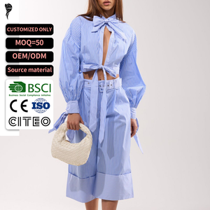 Completo da donna due pezzi OEM: camicia a righe con fiocco e pantaloni a gamba larga – Abbigliamento femminile, set coordinato - Product Image 1