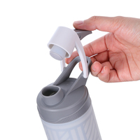 Fabricant Logo personnalisé Grande bouteille écologique en verre transparent coloré pour la boisson et le sport sans Bpa avec manchon en silicone