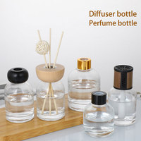 Vente en gros de bouteille de diffuseur vide ronde noire de luxe de 100ml 200ml avec bâton et boîte pour diffuseur d'huile aromatique