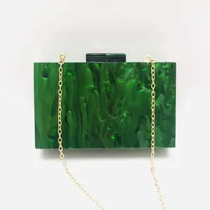 Custom made resin purses and clutches with embellishments ideal for resale by fashion accessory stores