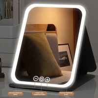 Miroir cosmétique de bureau pliable en cuir PU Miroir LED de maquillage portable à angle réglable avec trois lumières de couleur