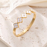 Bracelet jonc classique unisexe en acier inoxydable plaqué or 18 carats avec zircon et trèfle à quatre feuilles de haute qualité