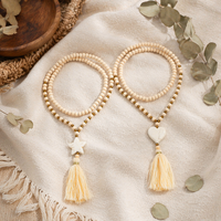Collier bohème fait main en perles de bois avec long pendentif à pompon, bijoux de mode en gros, directement de l'usine