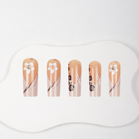 Vente en gros usine : Faux ongles à presser longs forme cercueil, motifs léopard nude et fleurs blanches avec strass, réutilisables, personnalisables OEM ODM