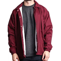 Logo personnalisé imprimé pour hommes veste d'entraîneurs classique coupe-vent en nylon résistance à l'eau coupe décontractée bouton pression manteau vierge