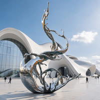 Sculpture moderne d'extérieur en acier inoxydable poli effet miroir, motif abstrait éclaboussures d'eau, tailles et couleurs personnalisables pour aménagement paysager de jardin