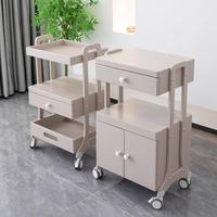 Dernière armoire de salon de tatouage d'art d'ongle multifonctionnelle moderne haut de gamme chariot de beauté en acier inoxydable avec support de rangement mobile