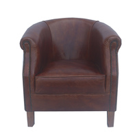 Fauteuil en cuir vintage brun vieilli de style américain pour projet hôtelier