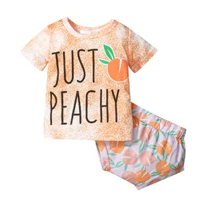 प्यारा बच्चा बच्चों लघु आस्तीन आड़ू मुद्रित टी शर्ट मुद्रित शॉर्ट्स कपड़े सेट गर्मी के कपड़े बच्चे के लिए कस्टम बच्चे को कपड़े