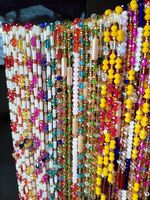 Chaîne de taille africaine en gros, bijoux de corps, style bohème, chaîne de taille élastique colorée en perles de riz pour femmes
