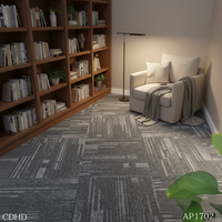 Dalles de moquette modulaires texturées grises, idéales pour les salons, les bibliothèques et les zones de lecture