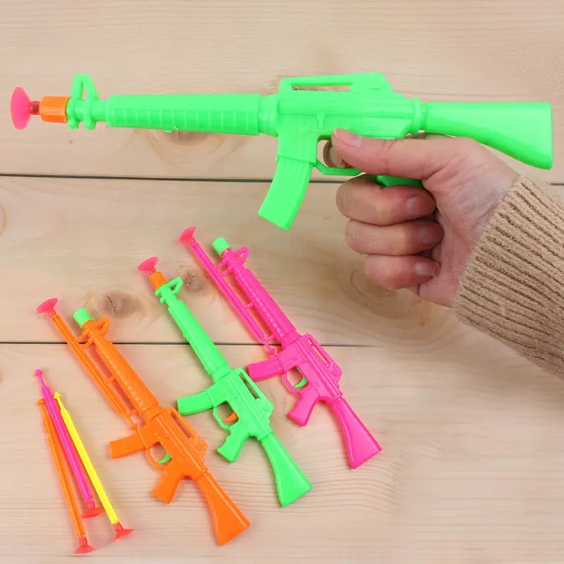 2024 best-seller dos desenhos animados otário arma de brinquedo pistola de lançamento de plástico otário arma tenda brinquedo fornecimento por atacado